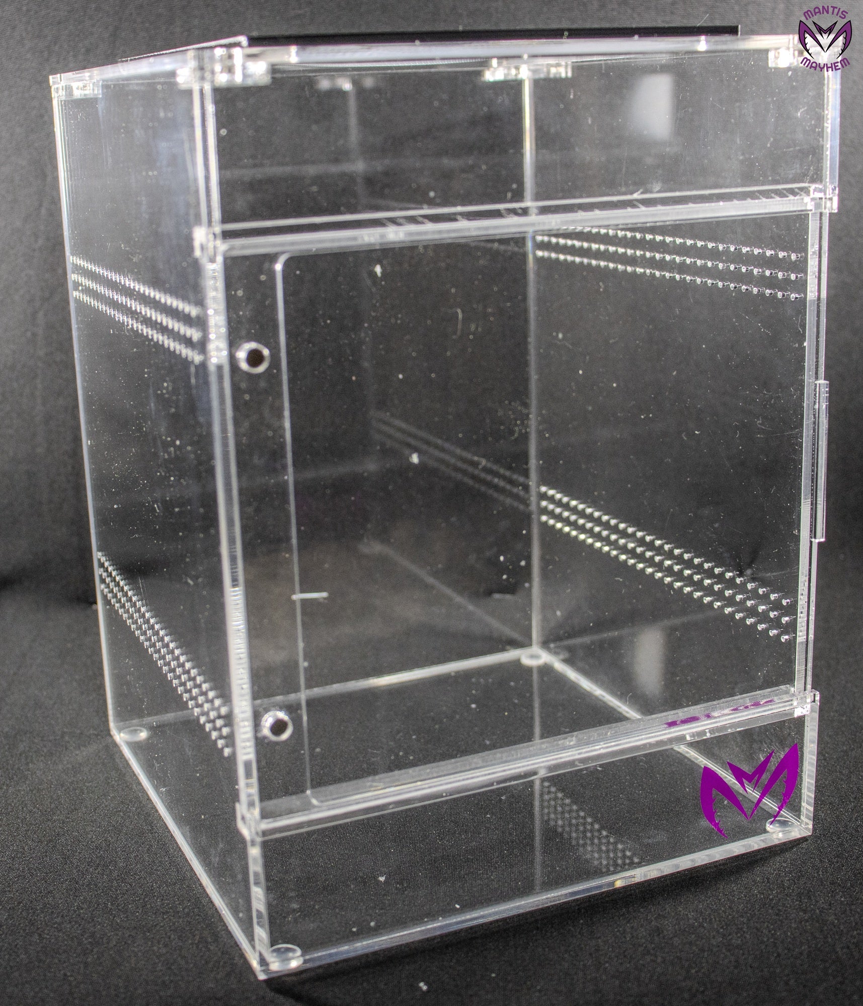 "Mesh-top arboreal mantis enclosure with sliding front door”

“Clear acrylic mantis tank with removable soft mesh lid”

“Tall insect enclosure ideal for arboreal mantis species”