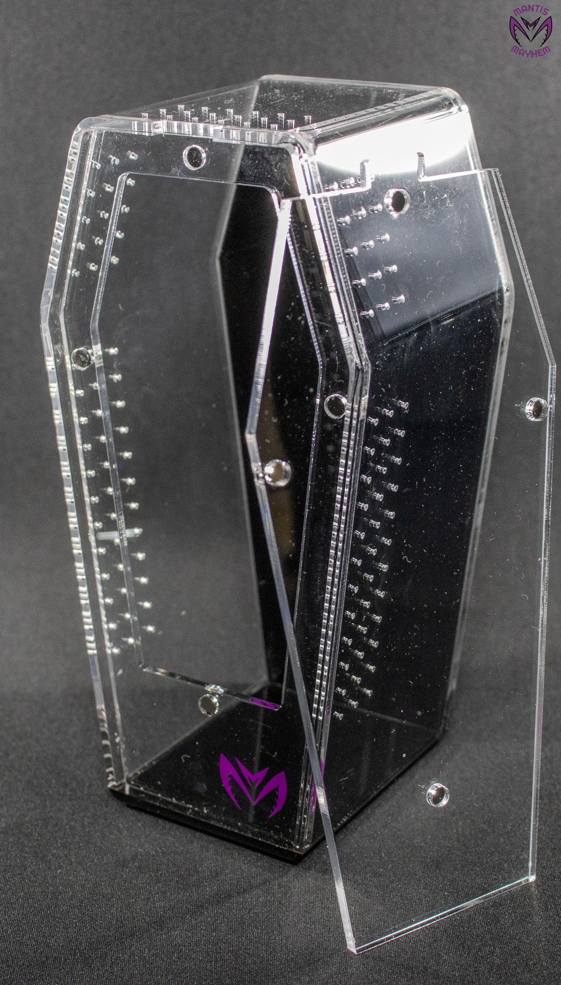 “Medium black coffin-shaped spider enclosure standing upright”

“Coffin-shaped jumping spider tank with front door open”

“Horizontal setup of coffin enclosure for terrestrial true spiders”

“Black and clear acrylic spider box with ventilation holes”